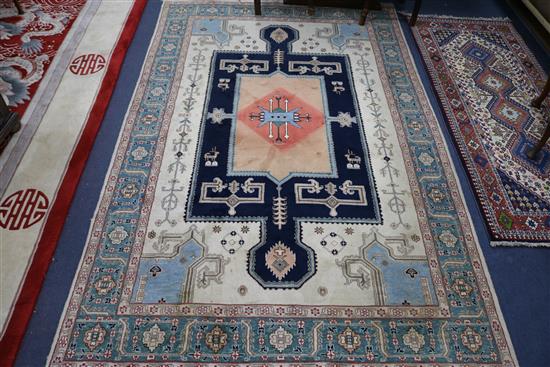 A Persian cream ground rug, 261 x 163cm